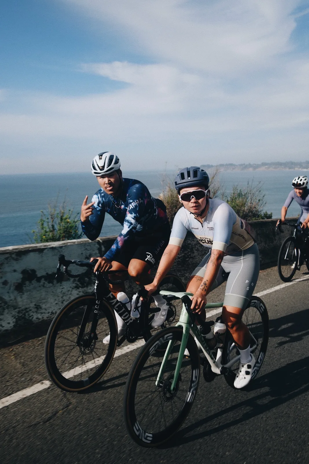 A happy group of cyclists gathered after a ride