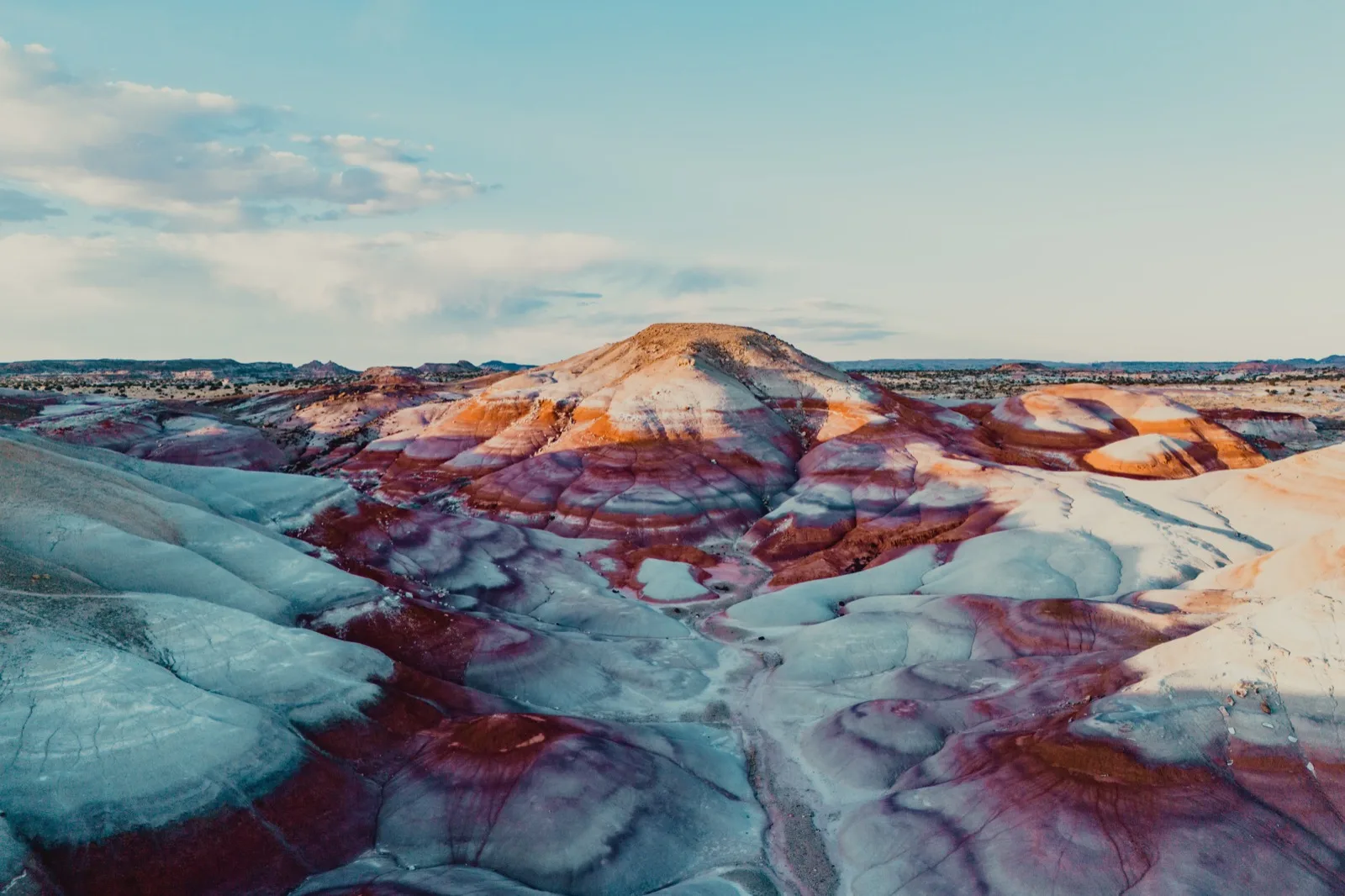 A broad aerial panorama of colorful sandstone